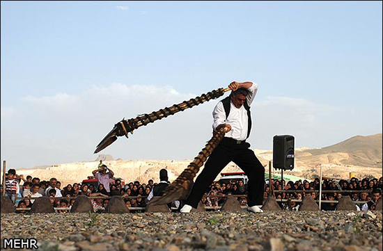 an athlete in shovel turning ceremonies