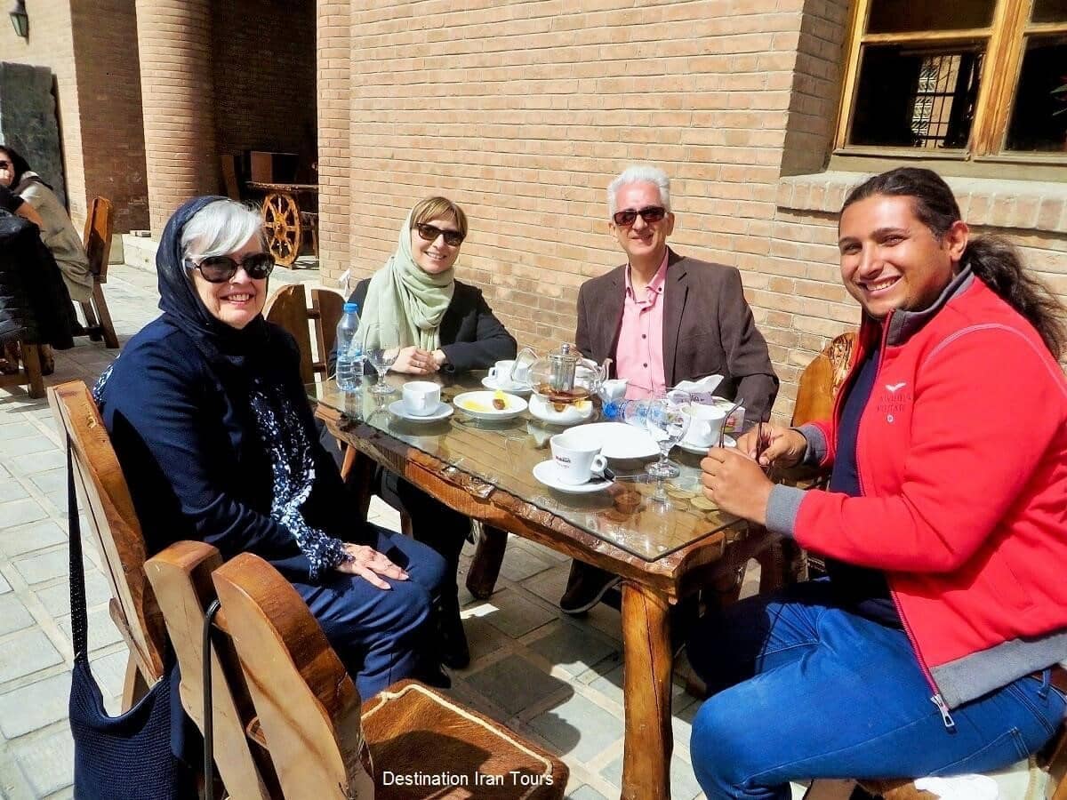 travelers in traditional Persian restaurant